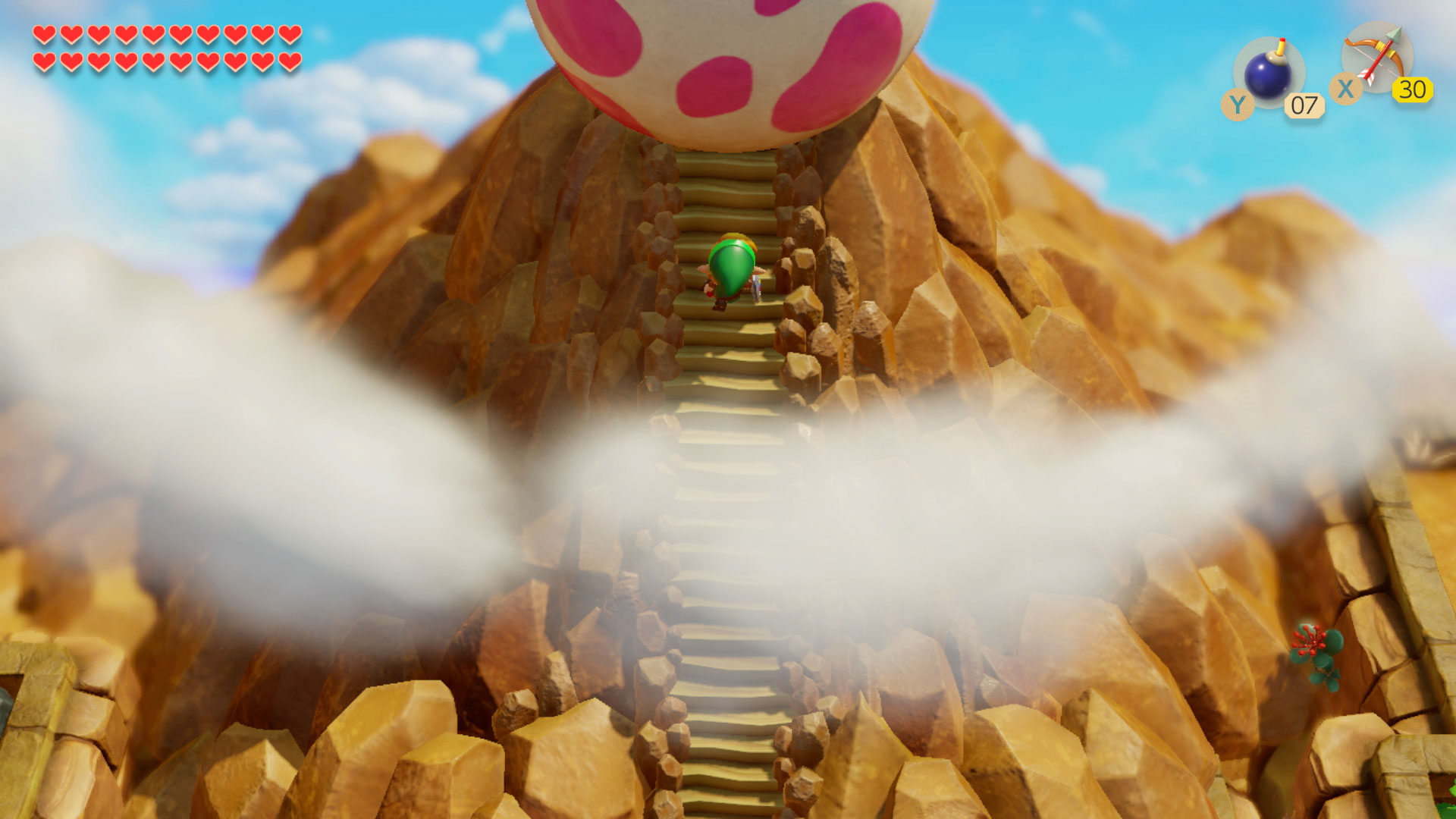 Climbing up mountain steps leading to the giant egg.
